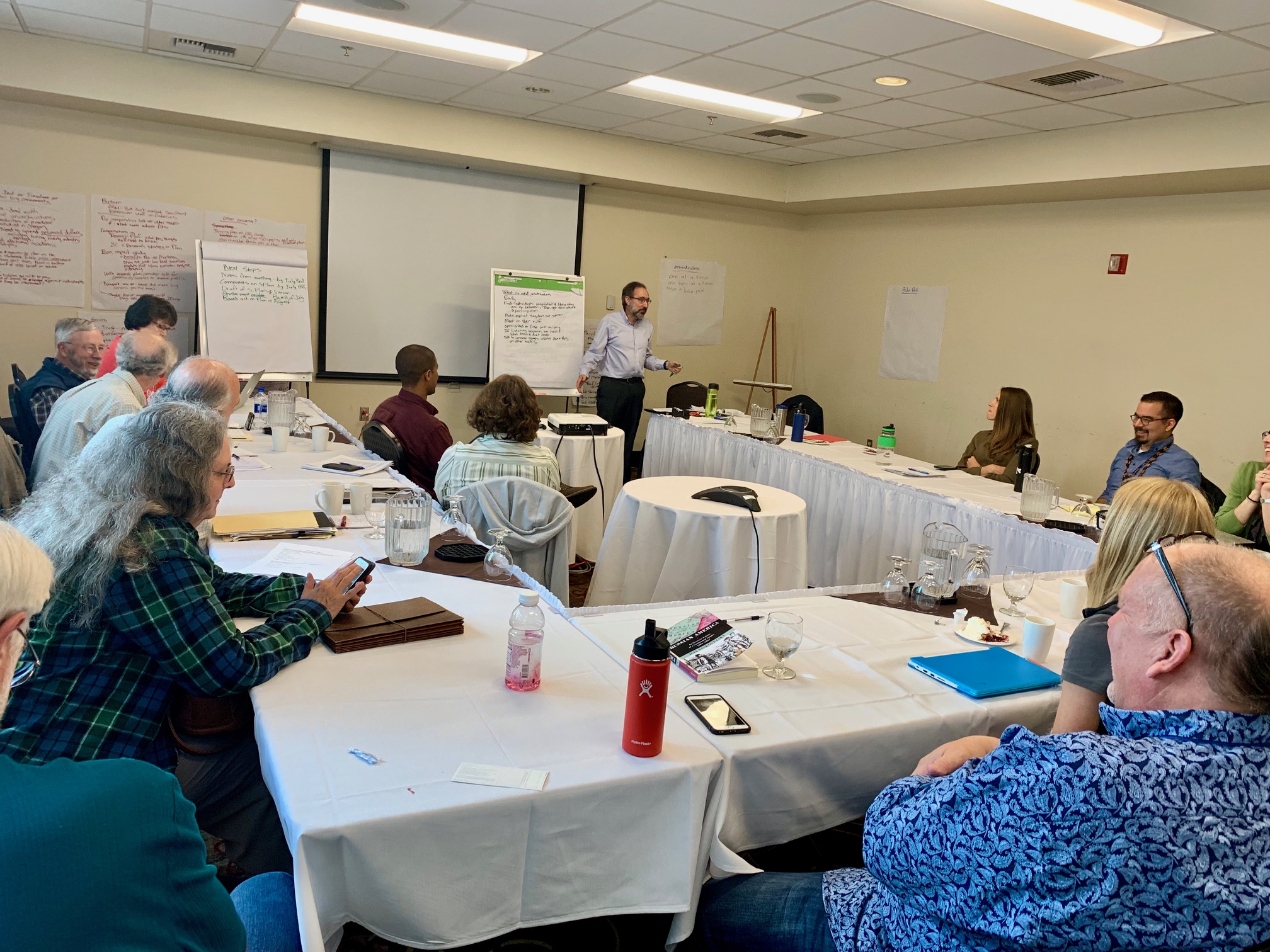 Jonathan Poisner facilitating a meeting at the Elakha Alliance